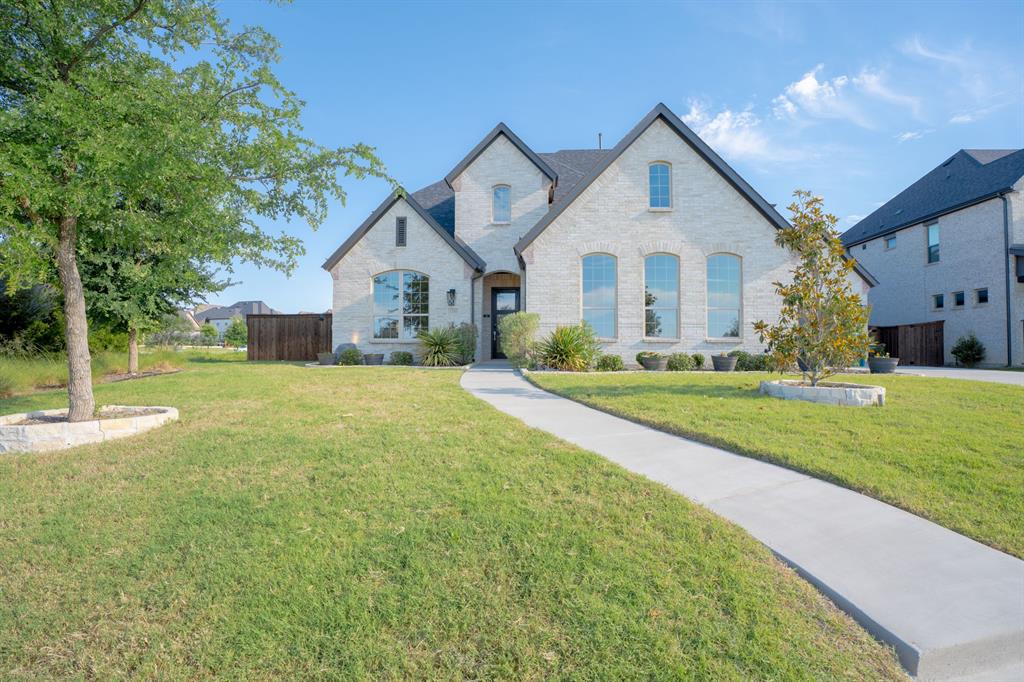 1316 Limestone Ridge Road Mansfield, TX 76063 - Photo 39 of 40 Contemporary residence featuring a light-colored brick exterior with dark trim