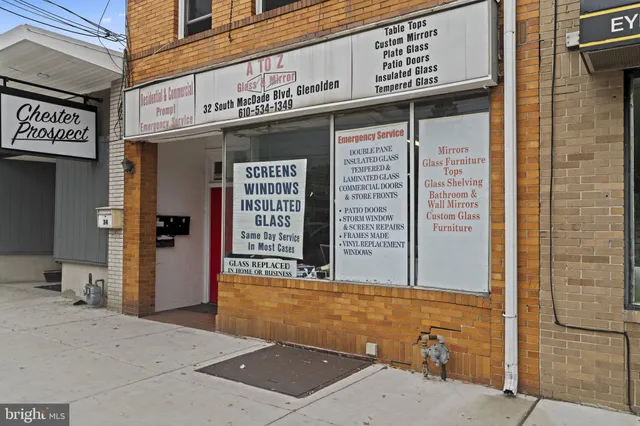 a view of a building with retail shops