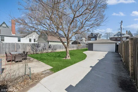 a view of a patio with a yard