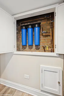 a utility room with closet dryer and washer