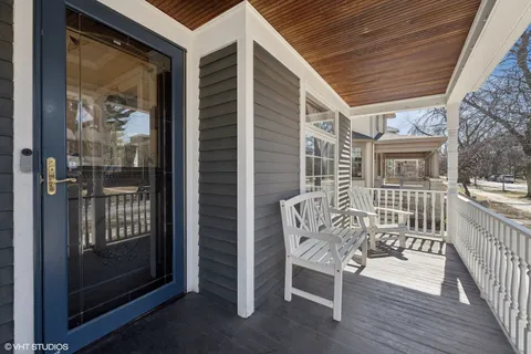 a patio with table and chairs