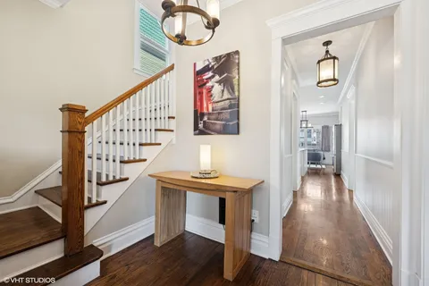 a view of entryway with wooden floor
