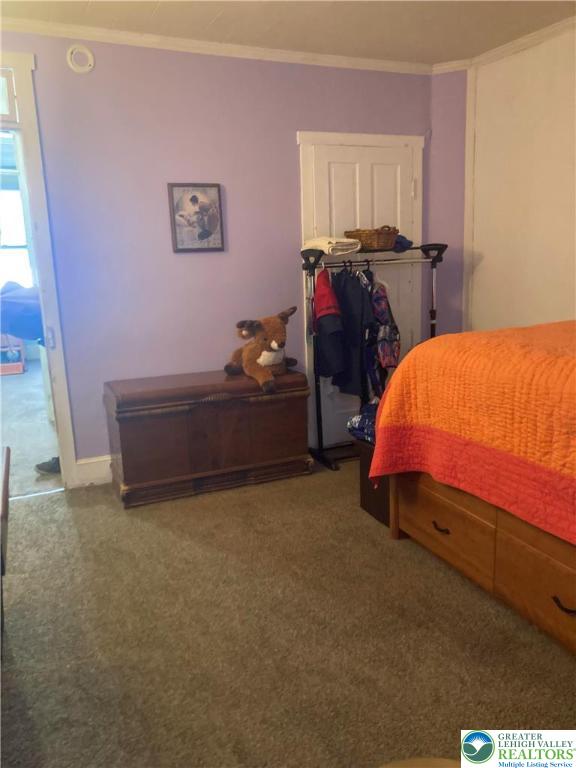 1820 Centre Street Ashland, PA 17921 - Photo 12 of 36 a bed room with a bed and a window