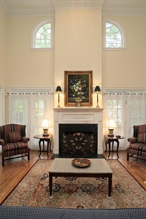 416 McDaniel Street Monroe, GA 30655 - Photo 19 of 69 a living room with furniture and a fireplace