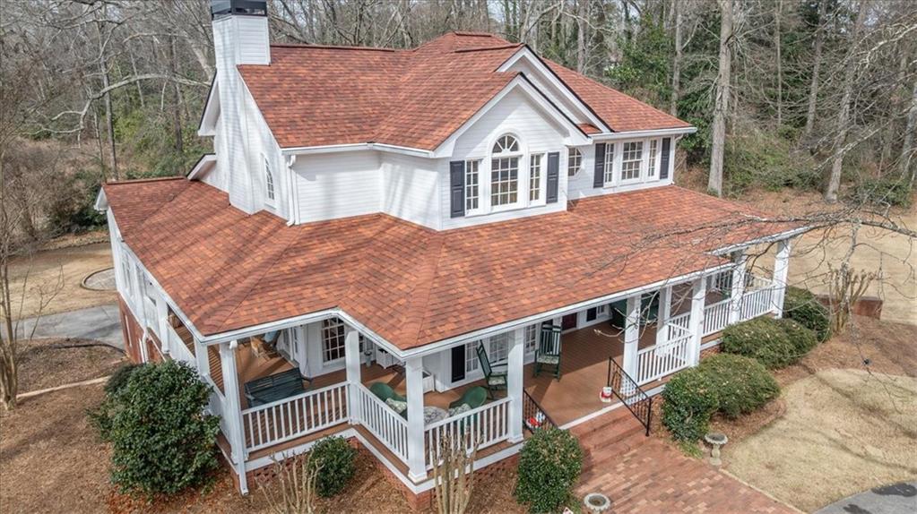 416 McDaniel Street Monroe, GA 30655 - Photo 49 of 69 a aerial view of a house with a yard and balcony