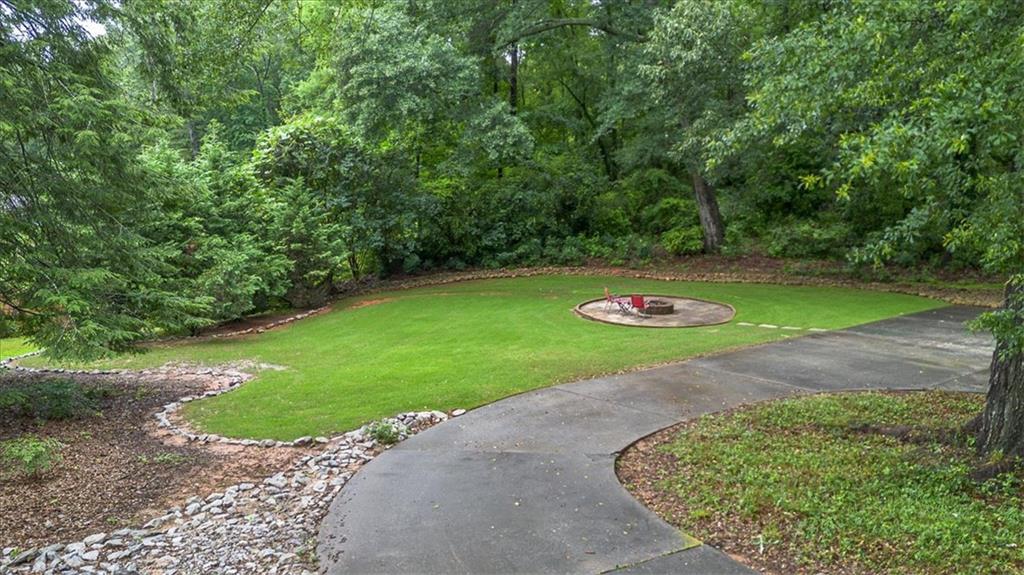 416 McDaniel Street Monroe, GA 30655 - Photo 68 of 69 a view of a backyard with green space