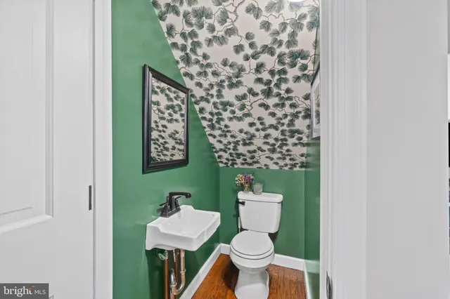 a bathroom with a toilet and a sink