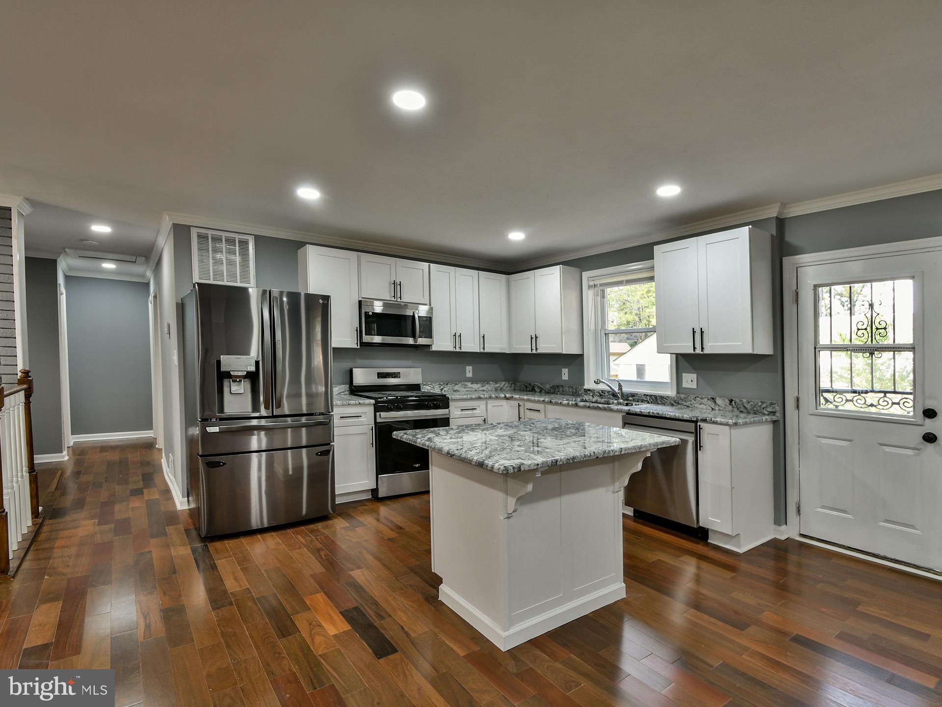 6918 Pine Valley Drive, Unit MAIN Glenn Dale, MD 20769 - Photo 9 of 41 Kitchen view from DR