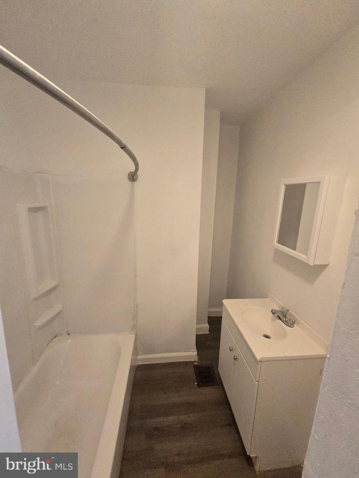 1316 Farson Street, Unit 2 Philadelphia, PA 19131 - Photo 3 of 5 a bathroom with a sink and a bathtub