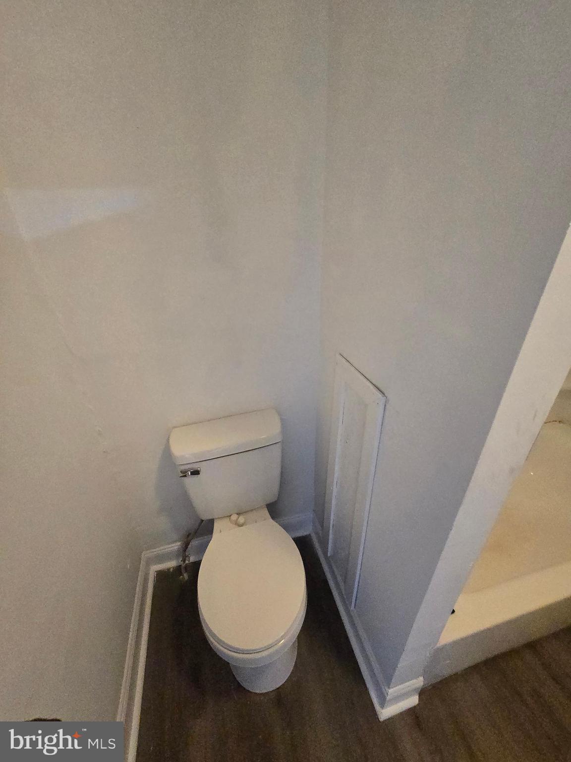 1316 Farson Street, Unit 2 Philadelphia, PA 19131 - Photo 4 of 5 a white toilet sitting next to a sink