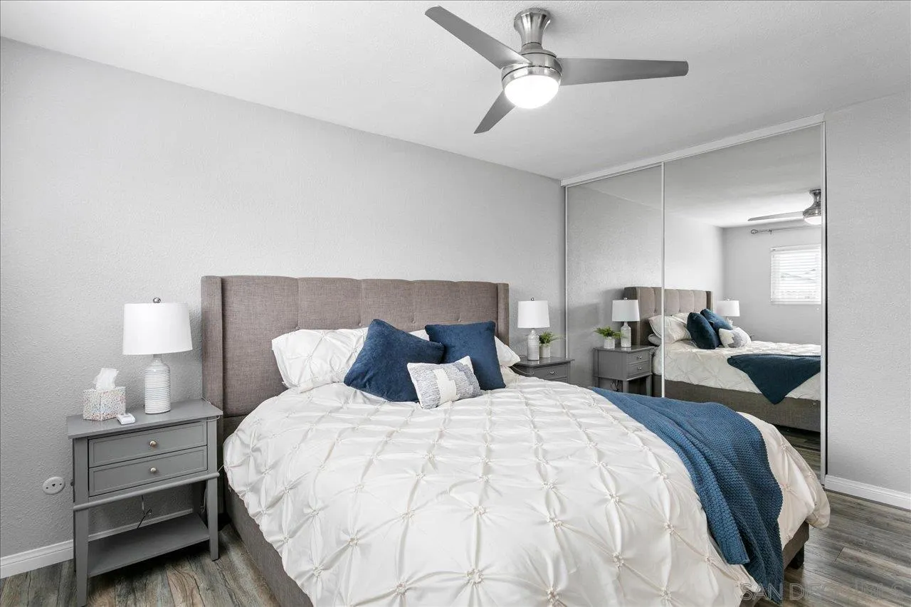 13663 Paseo Del Mar El Cajon, CA 92021 - Photo 15 of 36 a bedroom with bed and a chandelier