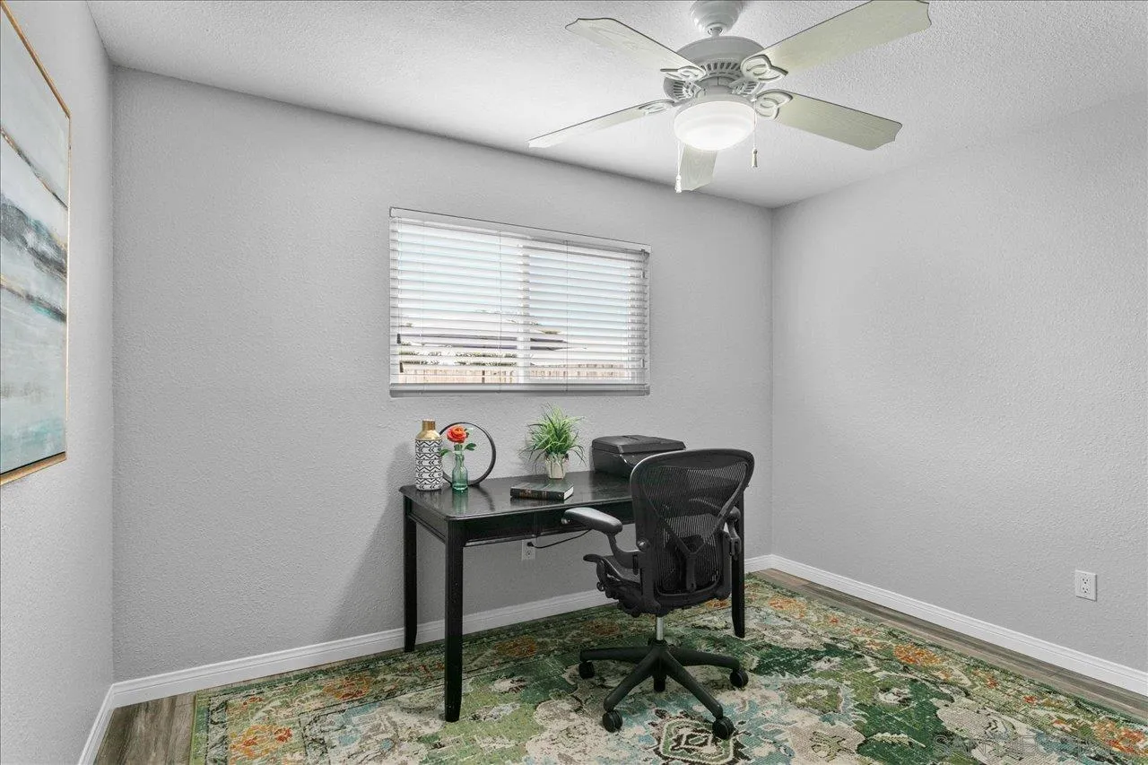 13663 Paseo Del Mar El Cajon, CA 92021 - Photo 19 of 36 a workspace with furniture and a window