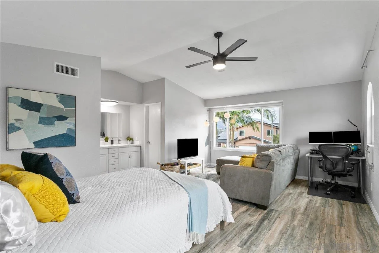 13663 Paseo Del Mar El Cajon, CA 92021 - Photo 21 of 36 a bedroom with a bed and a couch