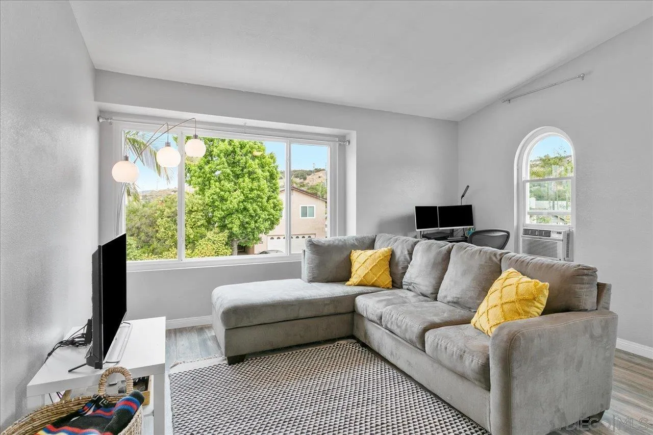 13663 Paseo Del Mar El Cajon, CA 92021 - Photo 23 of 36 a living room with furniture and a flat screen tv