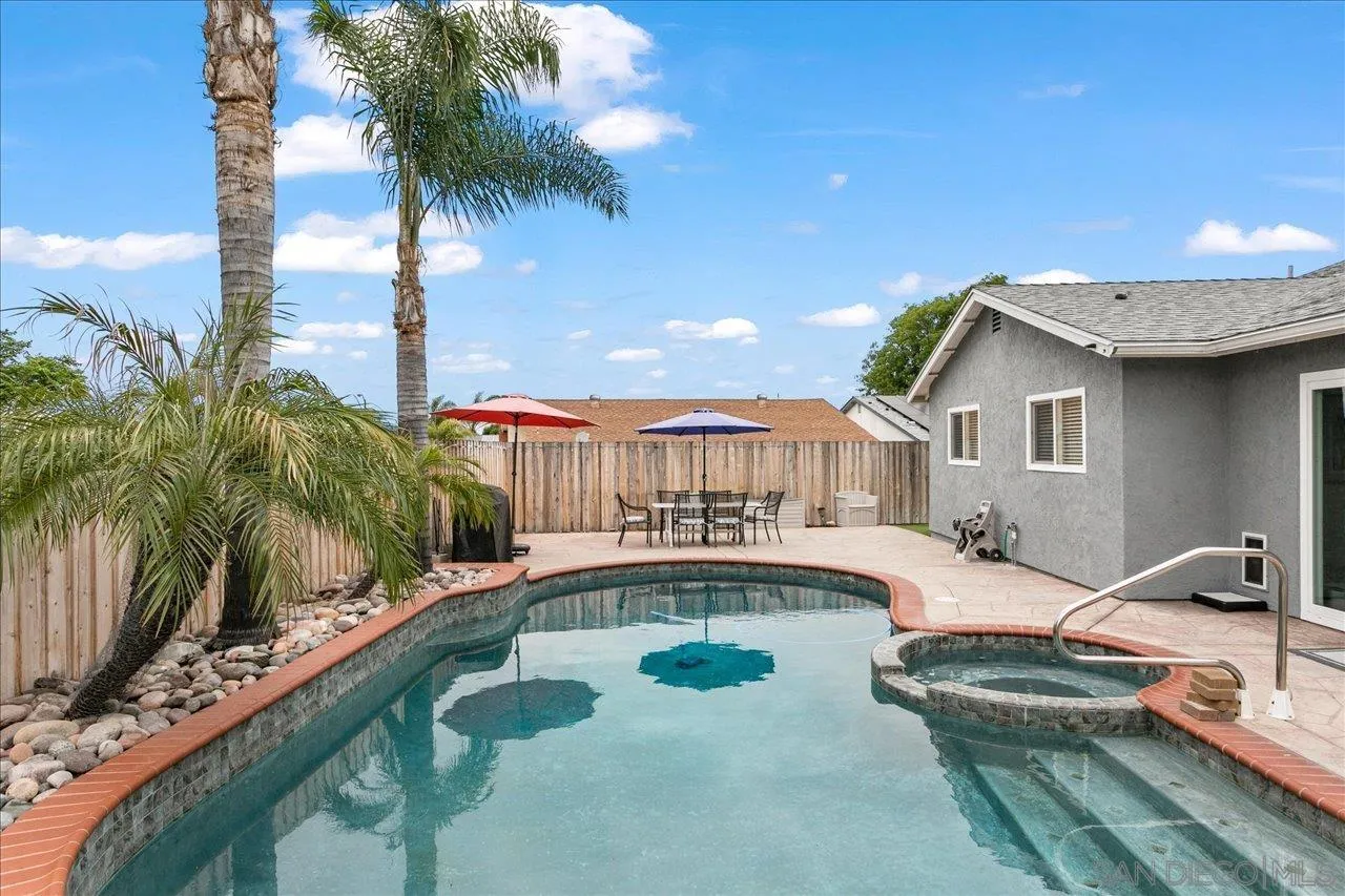 13663 Paseo Del Mar El Cajon, CA 92021 - Photo 28 of 36 a swimming pool with outdoor seating and yard