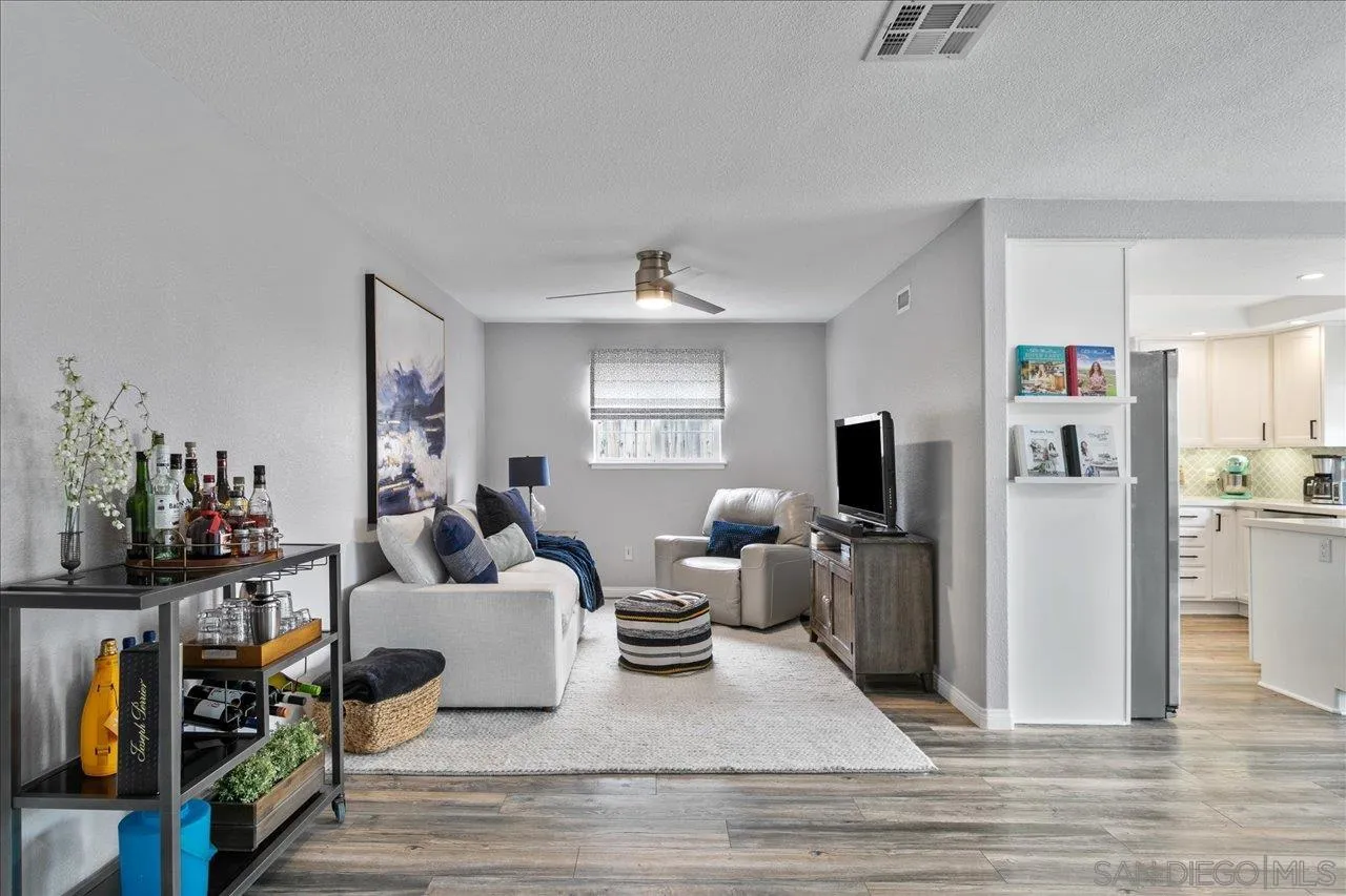 13663 Paseo Del Mar El Cajon, CA 92021 - Photo 8 of 36 a living room with furniture and a flat screen tv