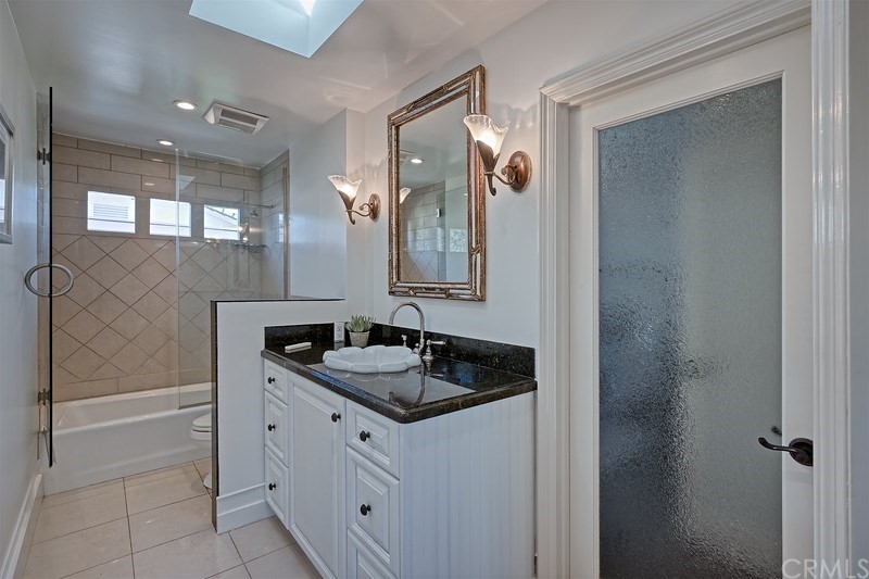 33701 Windjammer Drive Dana Point, CA 92629 - Photo 21 of 35 a bathroom with a sink and a mirror