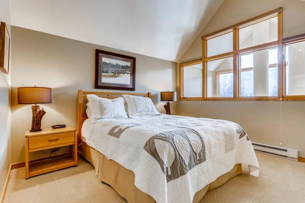 2017 Soda Ridge Road, Unit 1938 Keystone, CO 80435 - Photo 13 of 31 a bedroom with a bed and window