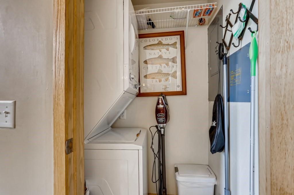 2017 Soda Ridge Road, Unit 1938 Keystone, CO 80435 - Photo 27 of 31 a utility room with dryer and washer