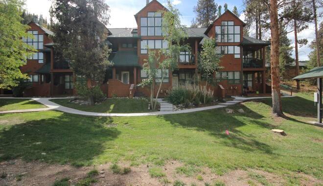 2017 Soda Ridge Road, Unit 1938 Keystone, CO 80435 - Photo 30 of 31 a view of a house with a yard