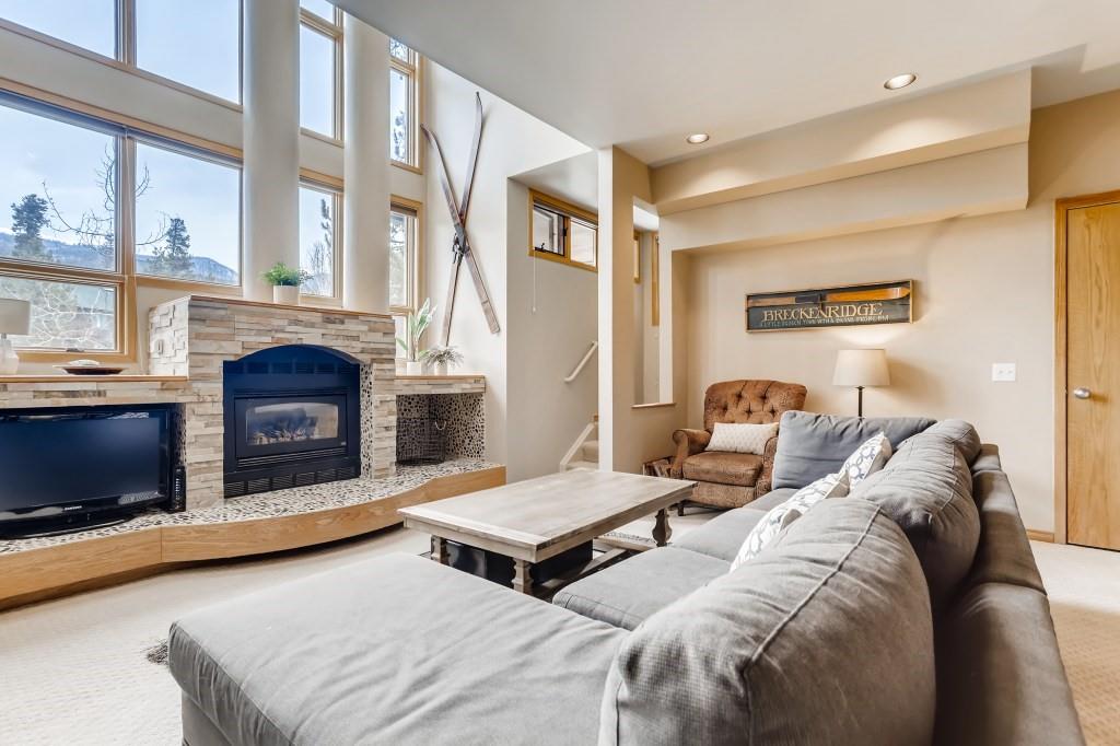 2017 Soda Ridge Road, Unit 1938 Keystone, CO 80435 - Photo 4 of 31 a living room with couches and a fireplace