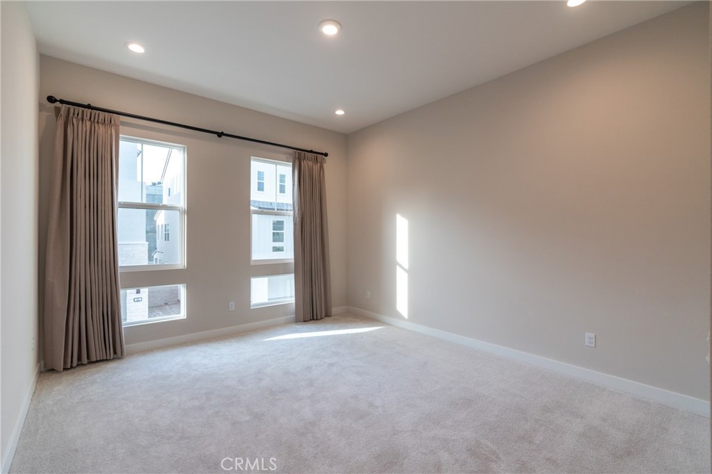 210 Pin Lane Lake Forest, CA 92630 - Photo 14 of 22 a view of an empty room with a window