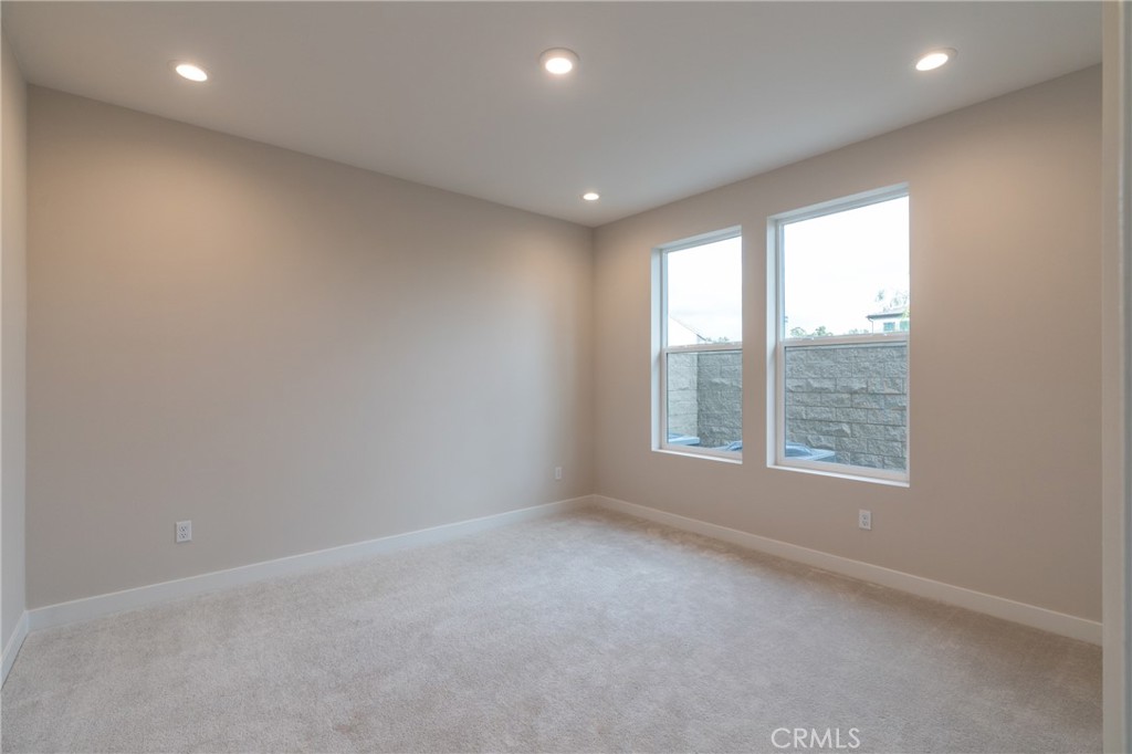 210 Pin Lane Lake Forest, CA 92630 - Photo 16 of 22 an empty room with a window