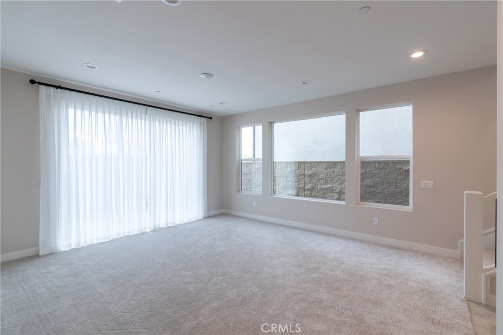 210 Pin Lane Lake Forest, CA 92630 - Photo 20 of 22 a view of an empty room with a window