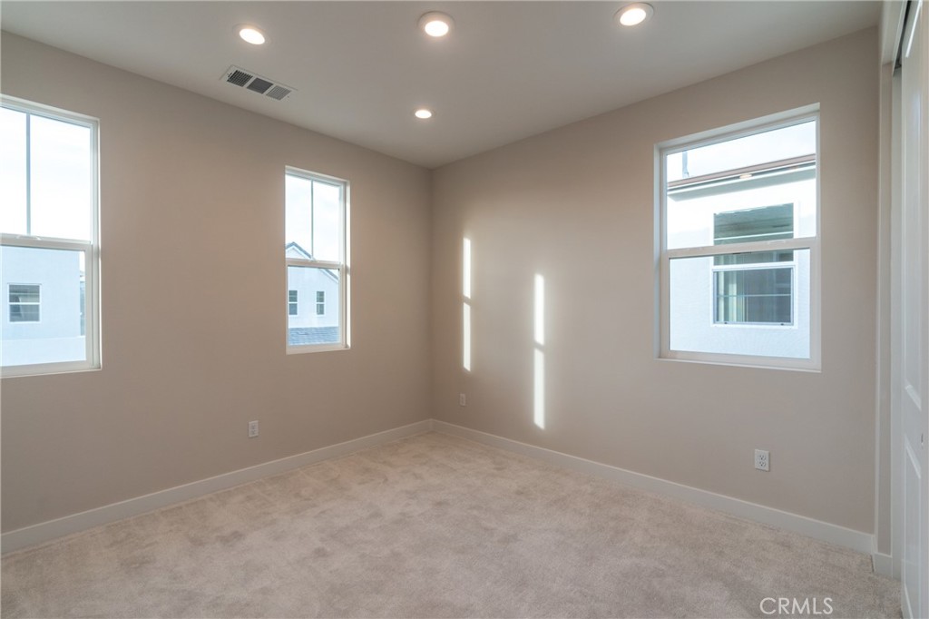210 Pin Lane Lake Forest, CA 92630 - Photo 5 of 22 an empty room with windows