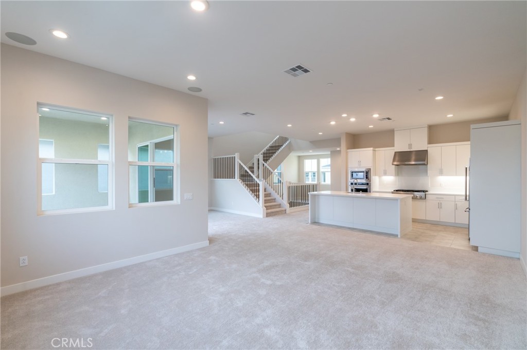 210 Pin Lane Lake Forest, CA 92630 - Photo 10 of 22 a view of kitchen with kitchen island and stainless steel appliances
