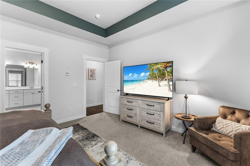 2253 Cotton Gin Row Jefferson, GA 30549 - Photo 19 of 45 a bed room with a bed and a television