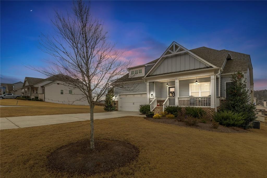 2253 Cotton Gin Row Jefferson, GA 30549 - Photo 2 of 45 a front view of a house with a yard
