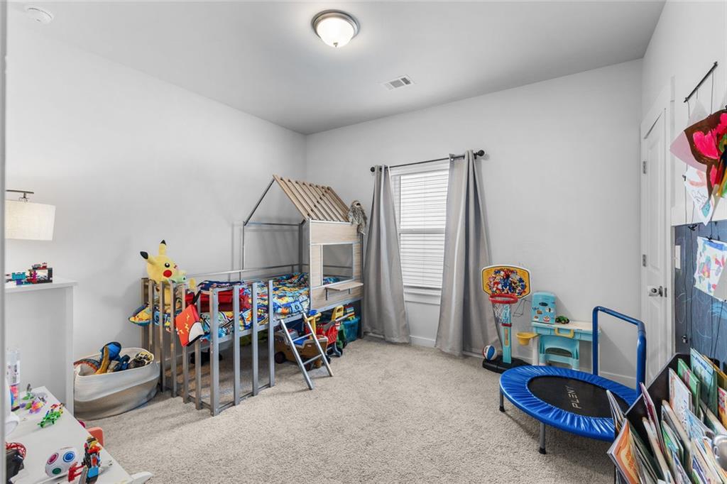 2253 Cotton Gin Row Jefferson, GA 30549 - Photo 24 of 45 a storage room with furniture and toys