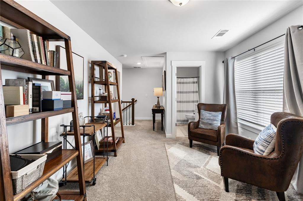2253 Cotton Gin Row Jefferson, GA 30549 - Photo 27 of 45 a living room with furniture and a window