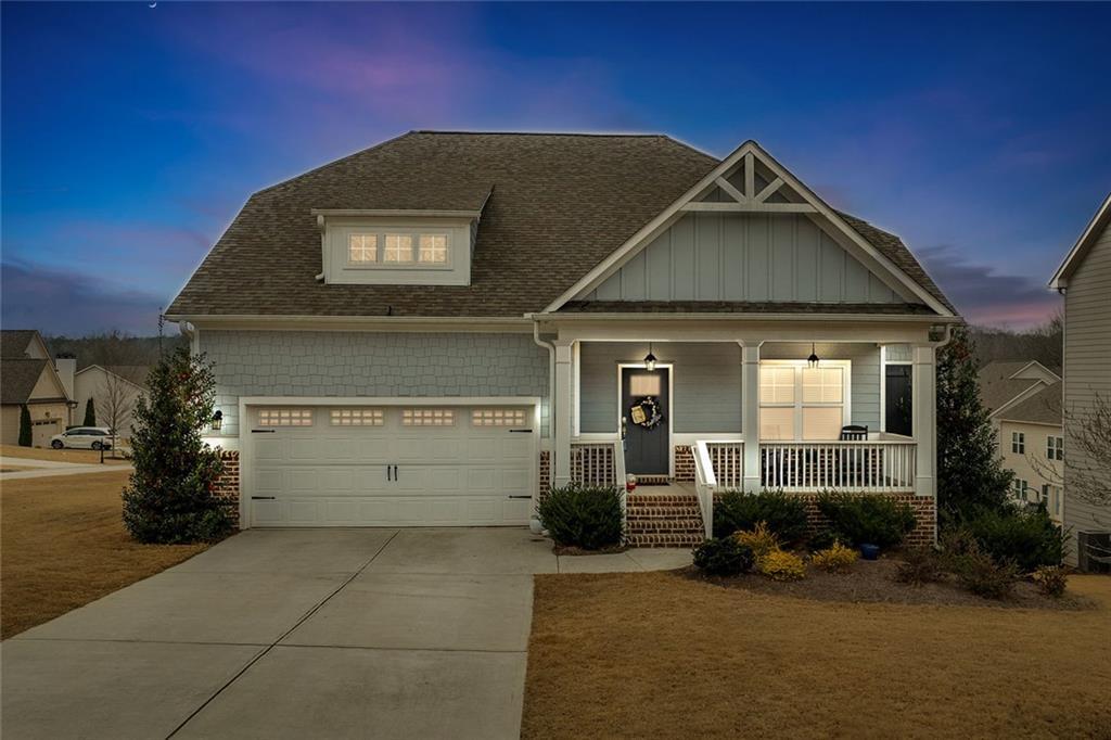 2253 Cotton Gin Row Jefferson, GA 30549 - Photo 3 of 45 a front view of a house with a yard