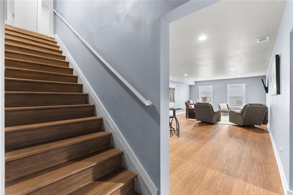 2253 Cotton Gin Row Jefferson, GA 30549 - Photo 31 of 45 a living room with furniture and a potted plant