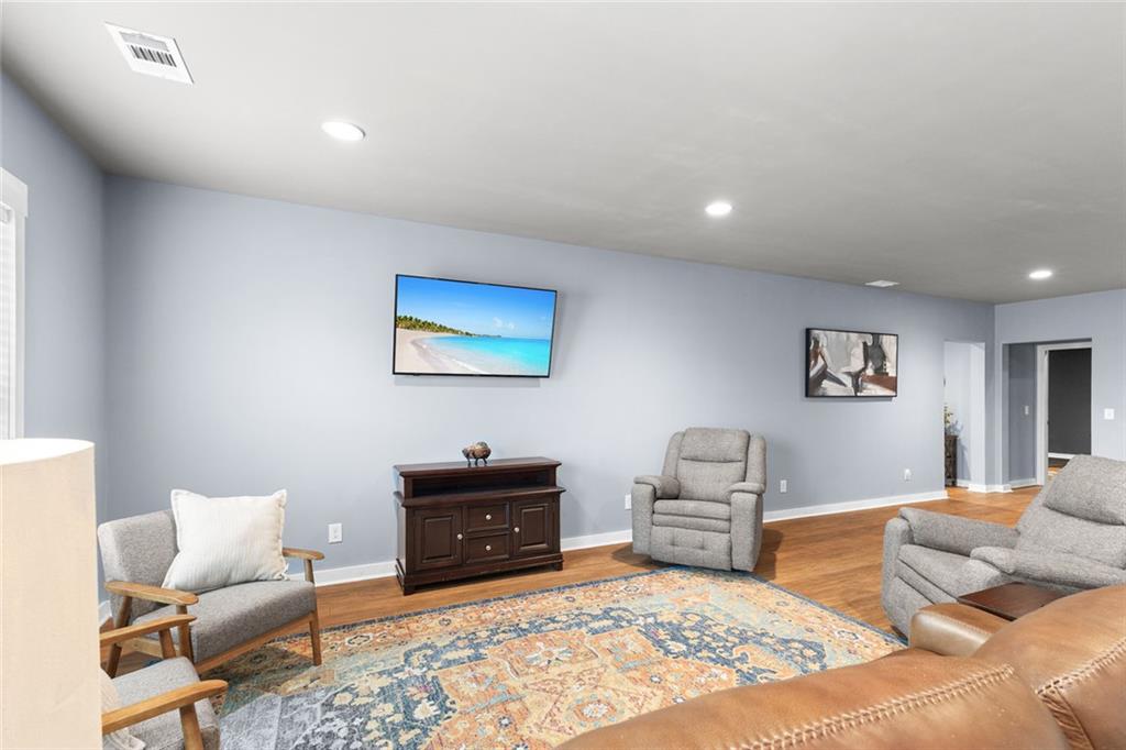 2253 Cotton Gin Row Jefferson, GA 30549 - Photo 35 of 45 a bedroom with furniture and a couch