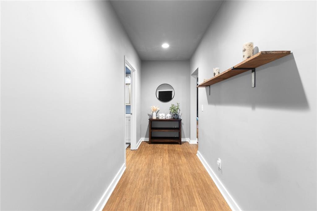 2253 Cotton Gin Row Jefferson, GA 30549 - Photo 37 of 45 a view of a hallway with wooden floor