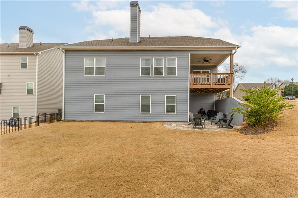 2253 Cotton Gin Row Jefferson, GA 30549 - Photo 6 of 45 a view of a house with backyard and sitting area