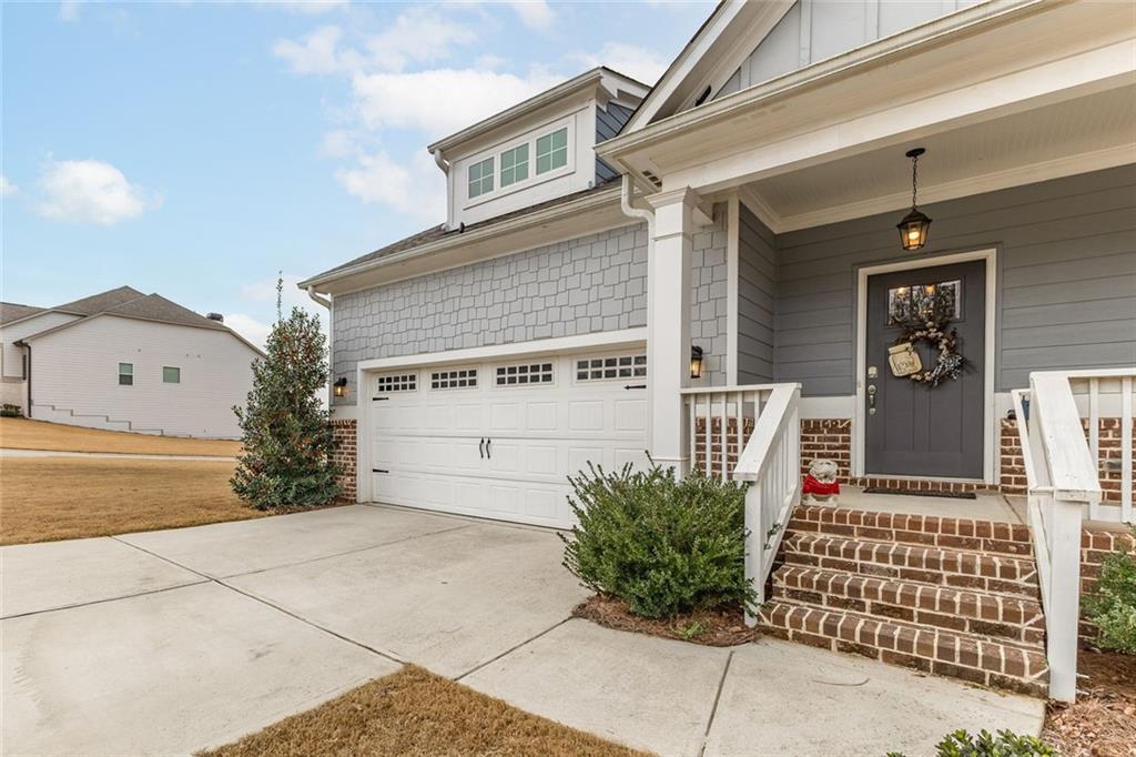 2253 Cotton Gin Row Jefferson, GA 30549 - Photo 7 of 45 a view of a house with a garage