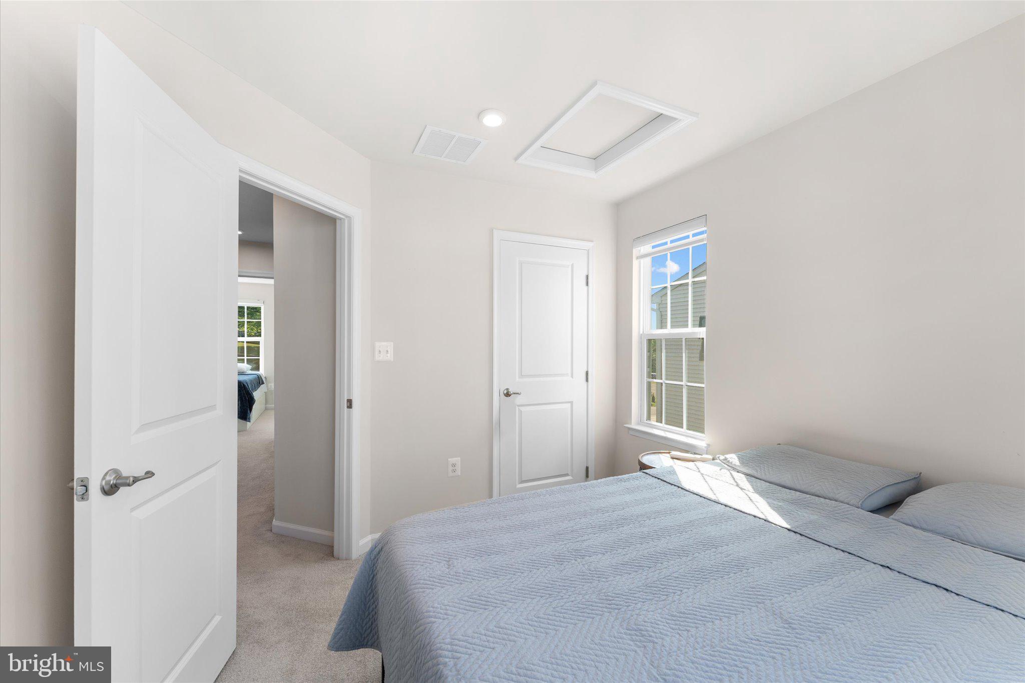 1776 Scenic Loop Culpeper, VA 22701 - Photo 25 of 36 a bedroom with a bed and a window