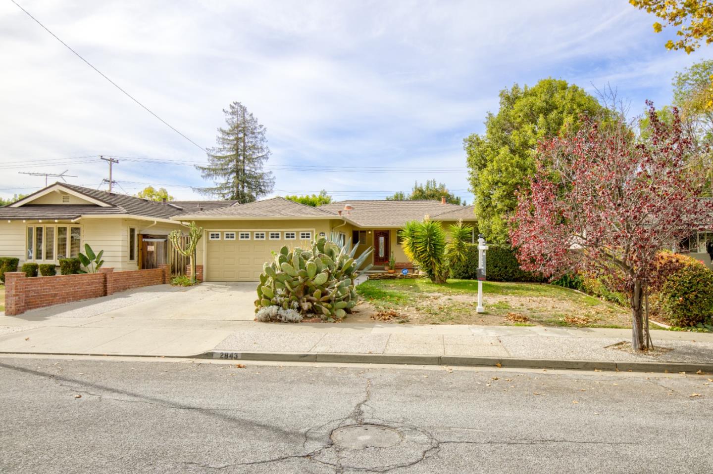 2843 Aragon Way San Jose, CA 95125 - Photo 1 of 26 a front view of a house with a yard and potted plants