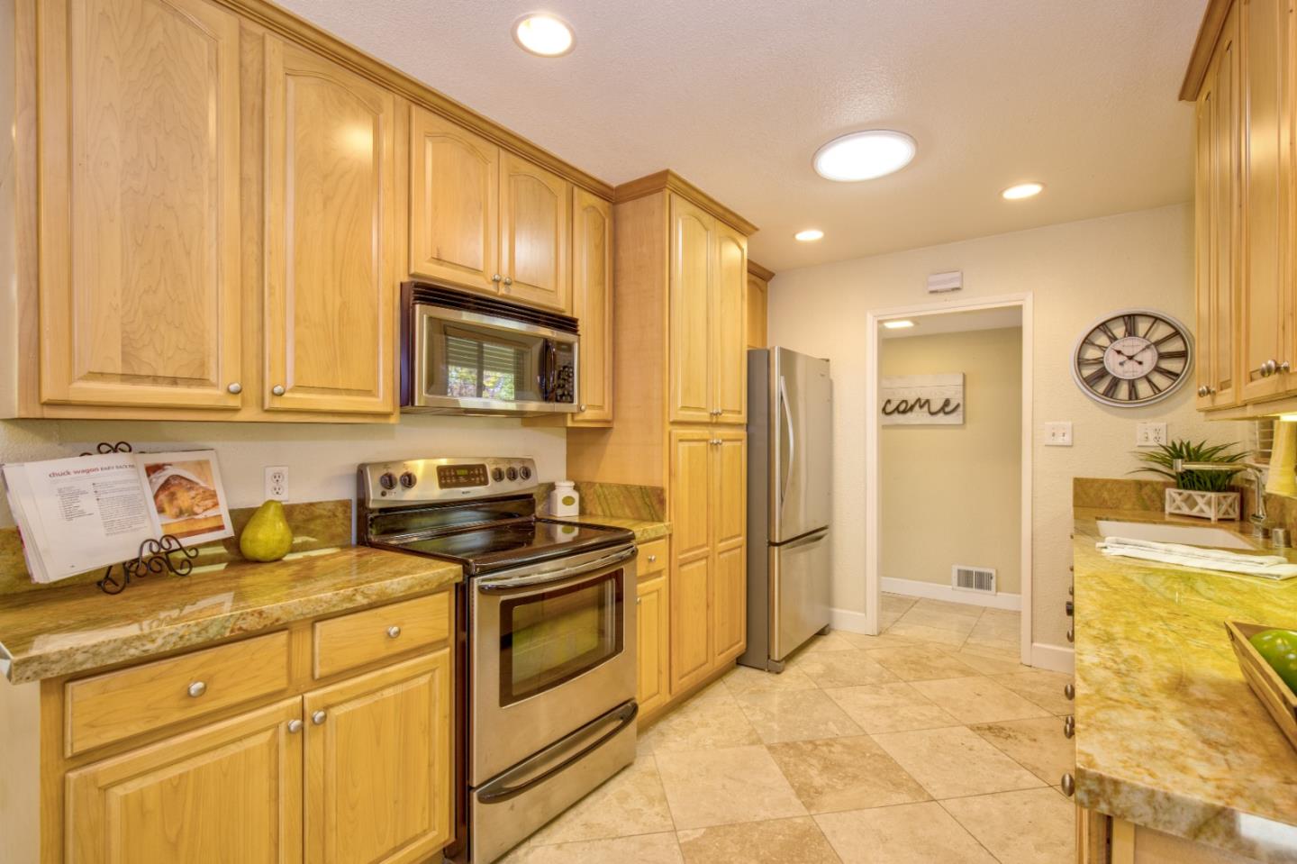 2843 Aragon Way San Jose, CA 95125 - Photo 13 of 26 a kitchen with stainless steel appliances granite countertop a stove a refrigerator and a sink