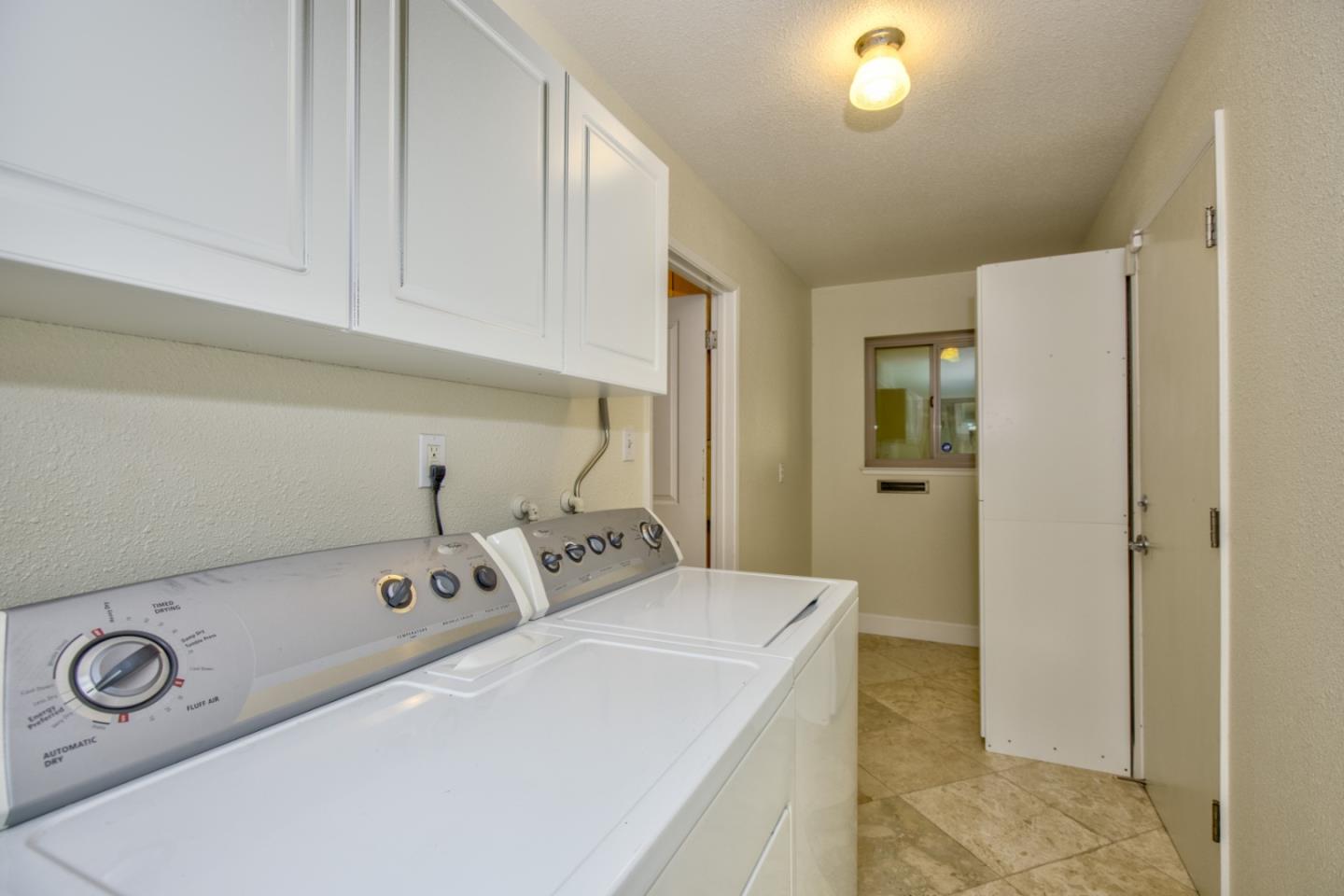 2843 Aragon Way San Jose, CA 95125 - Photo 22 of 26 a bathroom with a sink and a mirror