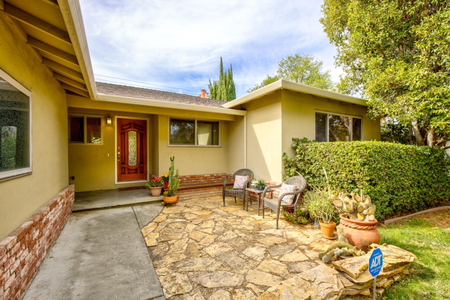 2843 Aragon Way San Jose, CA 95125 - Photo 3 of 26 a backyard of a house with table and chairs
