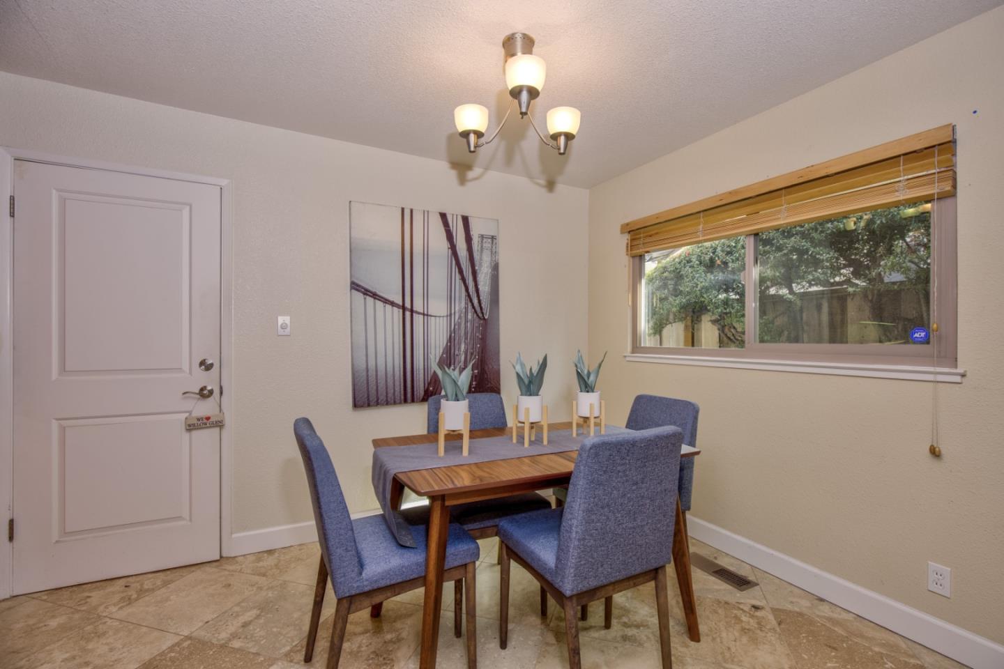 2843 Aragon Way San Jose, CA 95125 - Photo 10 of 26 a view of a dining room with furniture window and outside view