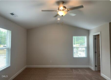 6927 Eddy Point Lane Raleigh, NC 27616 - Photo 13 of 27 an empty room with windows and fan