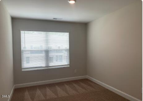 6927 Eddy Point Lane Raleigh, NC 27616 - Photo 18 of 27 an empty room with a window