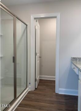 6927 Eddy Point Lane Raleigh, NC 27616 - Photo 24 of 27 a view of an empty room with wooden floor