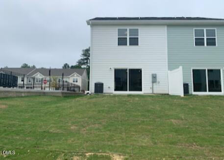 6927 Eddy Point Lane Raleigh, NC 27616 - Photo 25 of 27 a front view of house with yard and outdoor seating